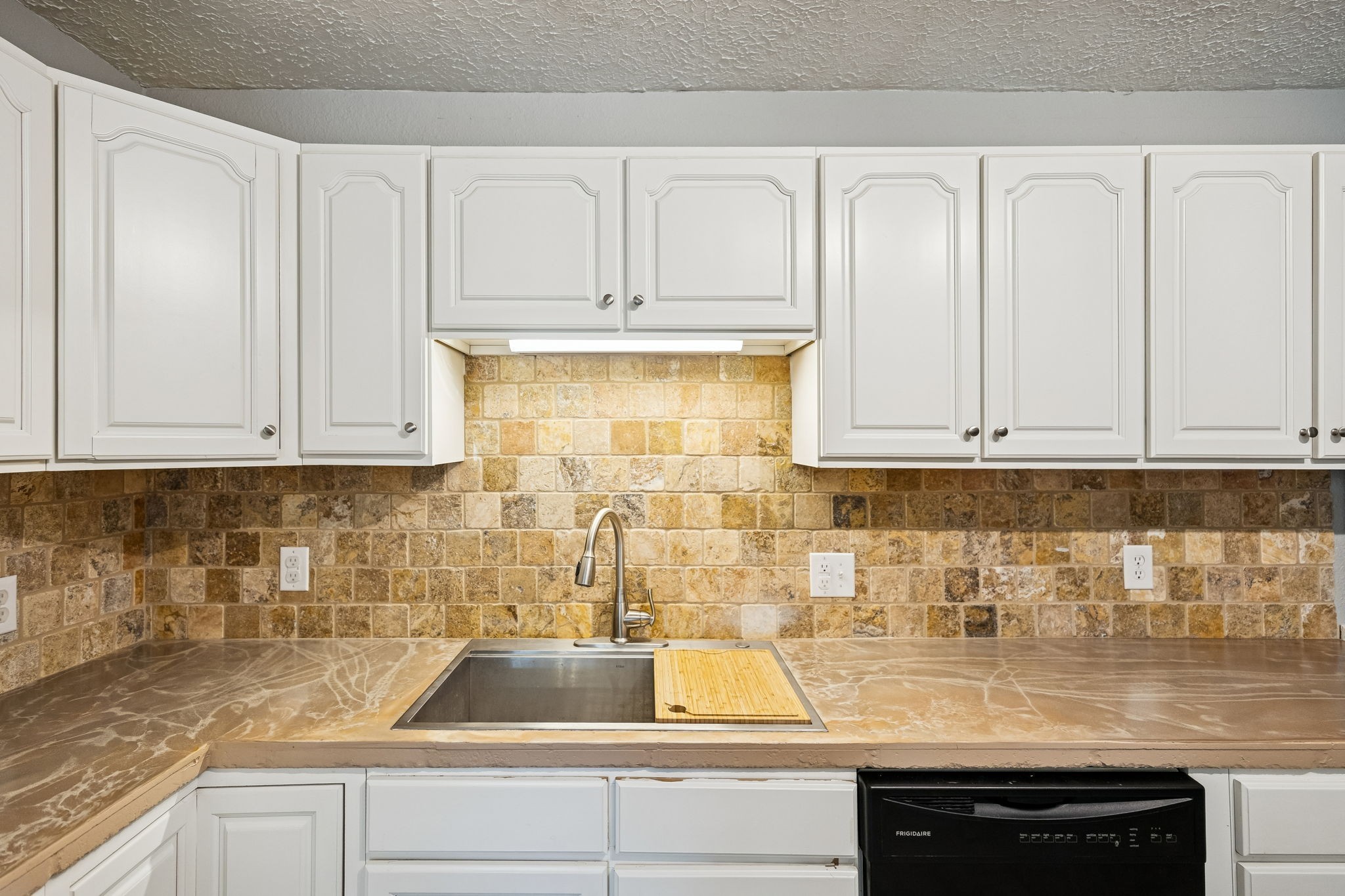 2370 Patton Hollow Road Watertown, TN 37184 - Photo 19 of 50 a kitchen with granite countertop white cabinets and sink