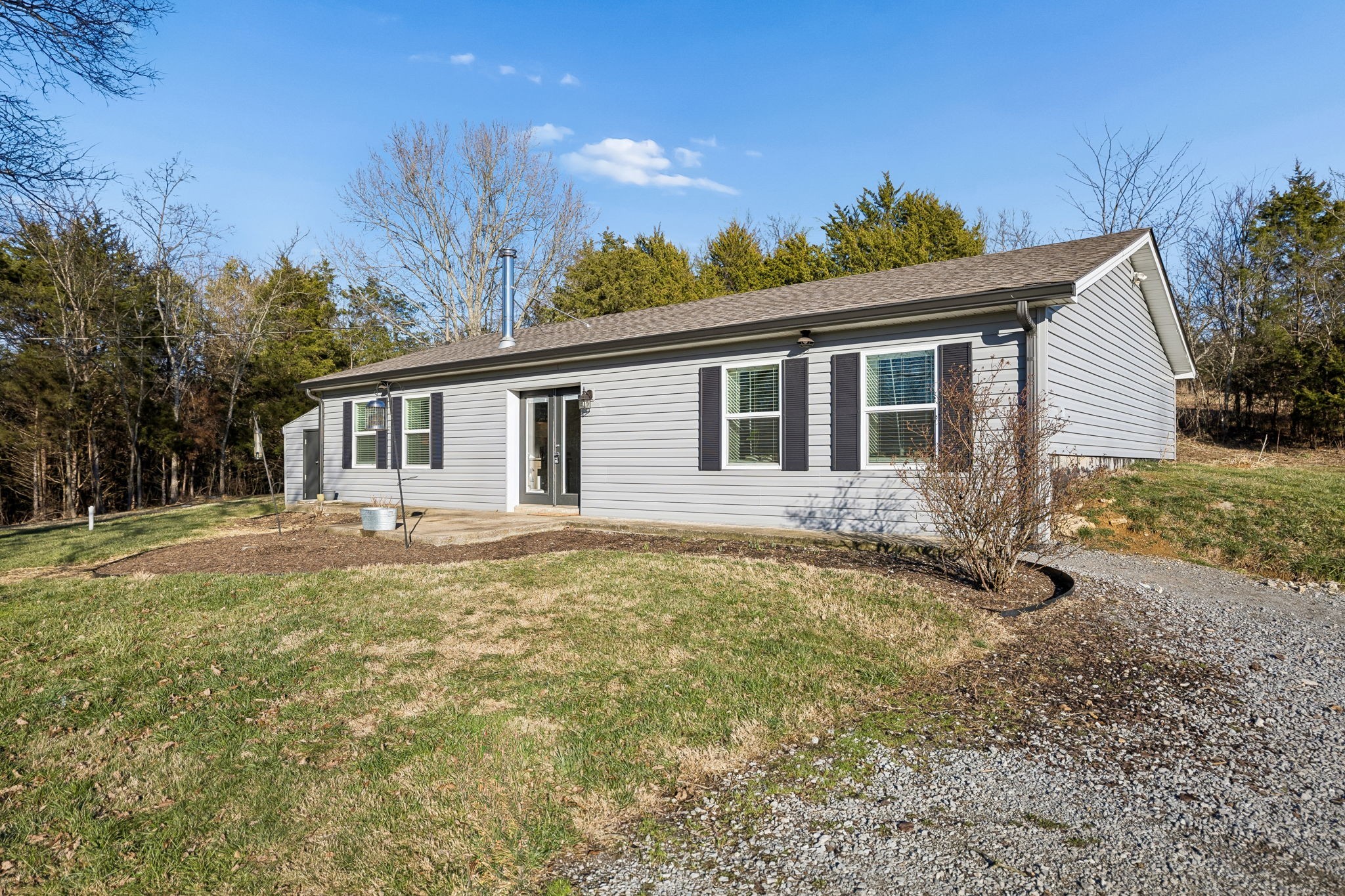 2370 Patton Hollow Road Watertown, TN 37184 - Photo 26 of 50 a view of a house with a yard