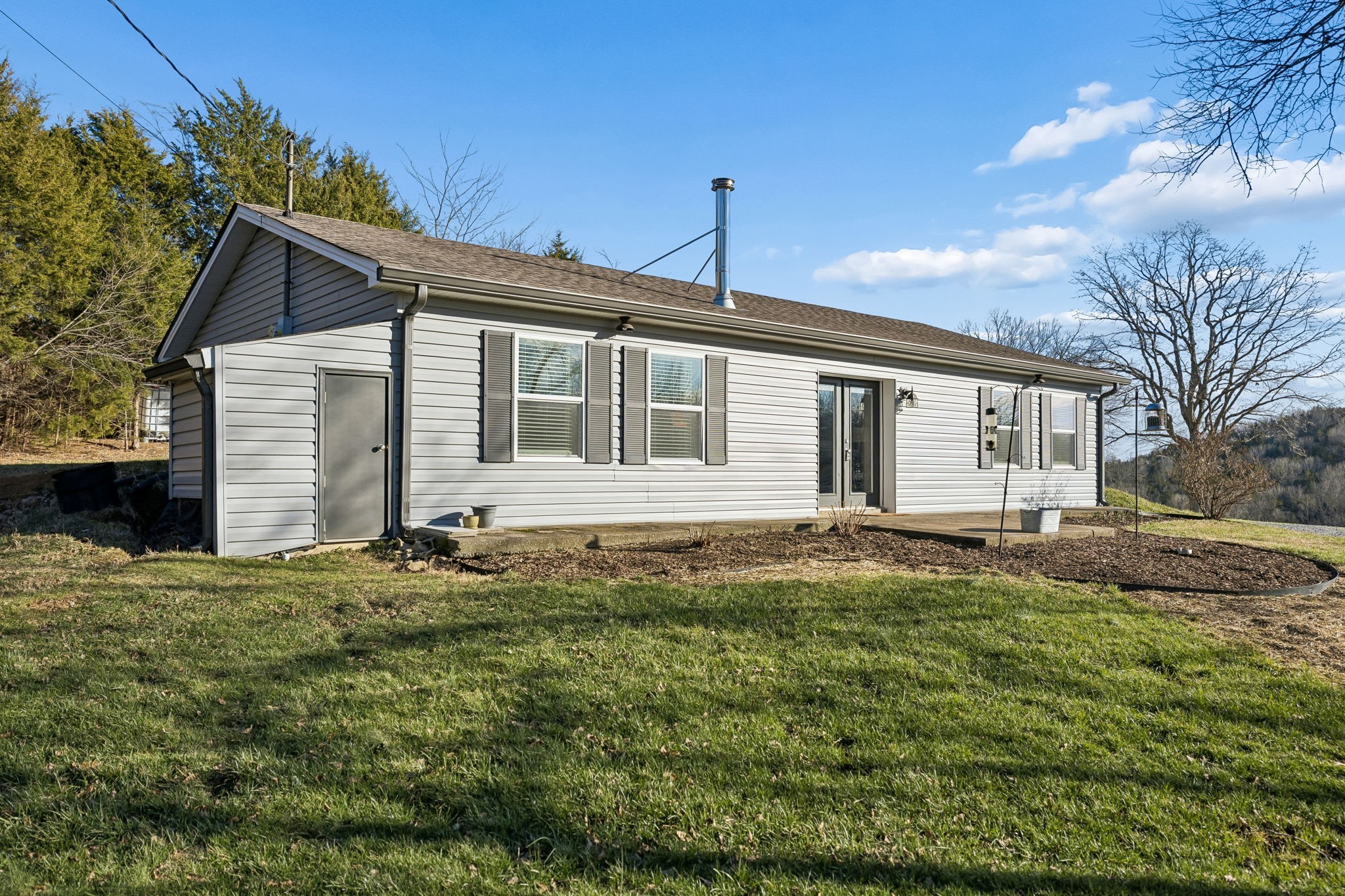 2370 Patton Hollow Road Watertown, TN 37184 - Photo 28 of 50 a house with a yard