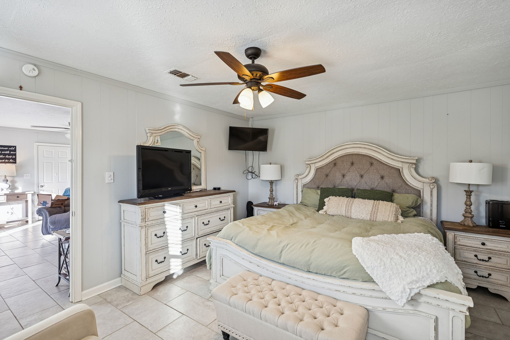 2370 Patton Hollow Road Watertown, TN 37184 - Photo 3 of 50 a bedroom with a bed and a flat screen tv