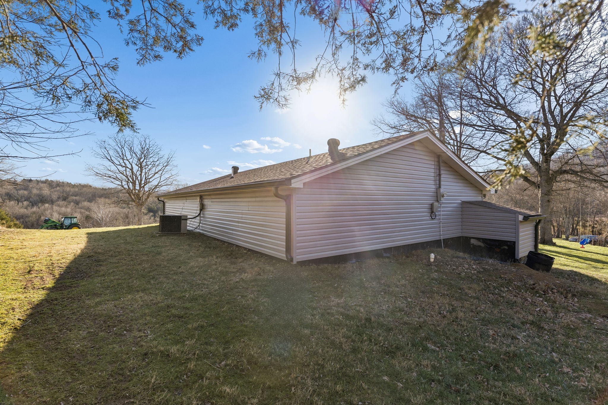 2370 Patton Hollow Road Watertown, TN 37184 - Photo 32 of 50 a view of a house with a yard