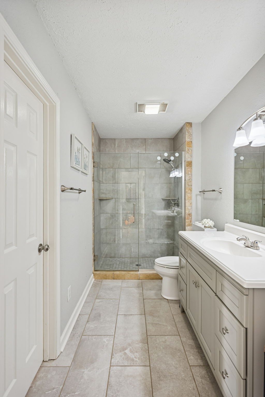 2370 Patton Hollow Road Watertown, TN 37184 - Photo 7 of 50 a bathroom with a granite countertop sink a toilet and shower
