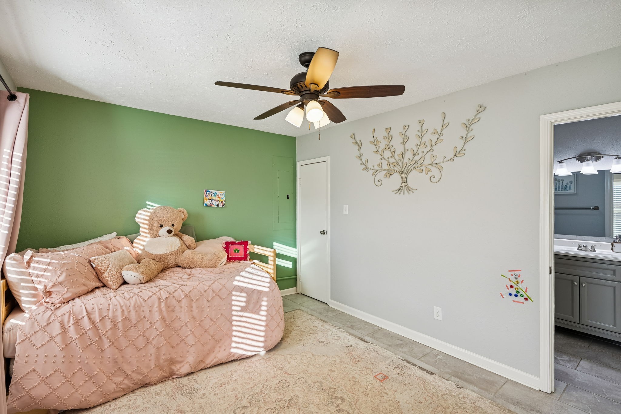 2370 Patton Hollow Road Watertown, TN 37184 - Photo 9 of 50 a bedroom with a bed and a chandelier fan