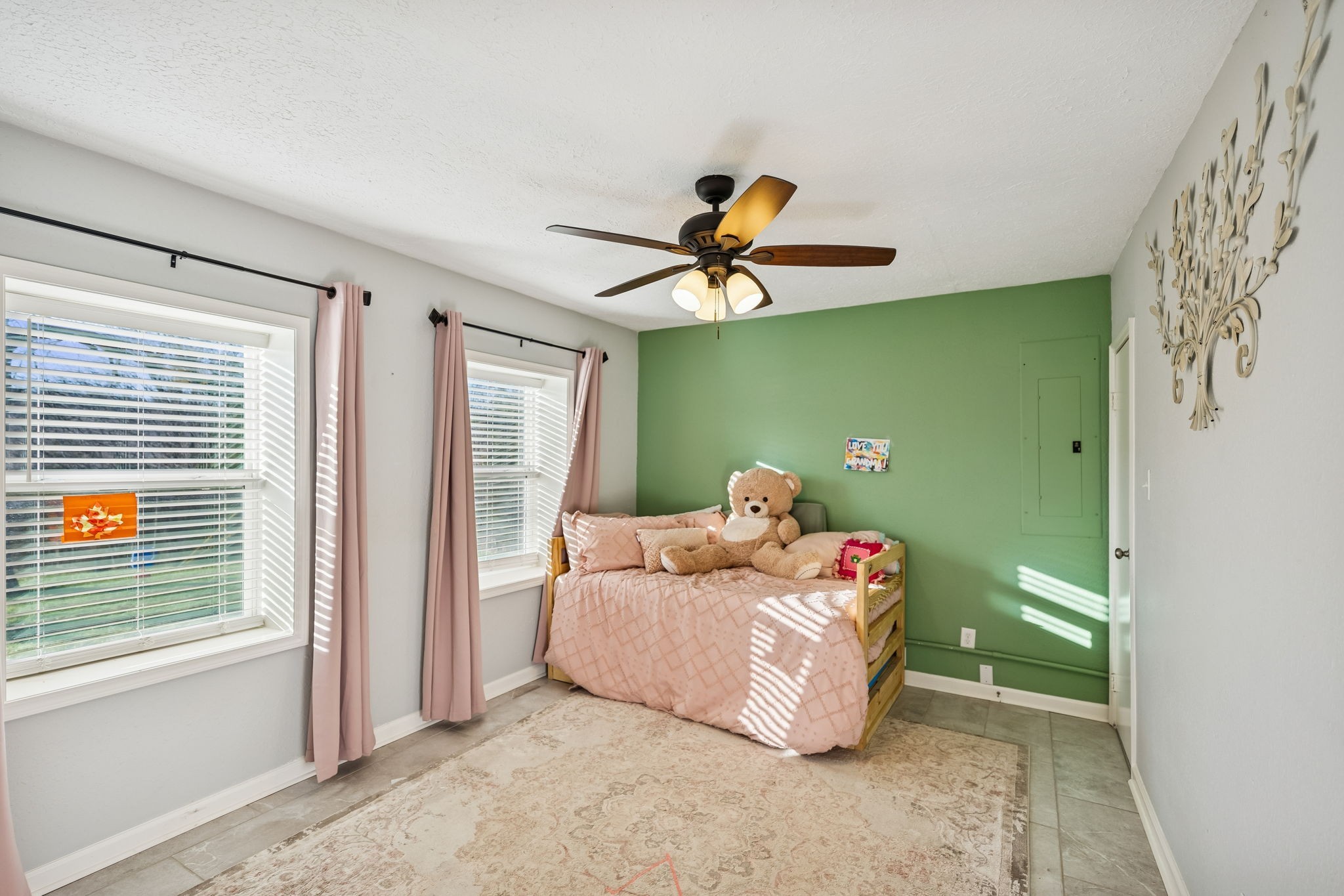 2370 Patton Hollow Road Watertown, TN 37184 - Photo 10 of 50 a bedroom with a bed and a chandelier fan