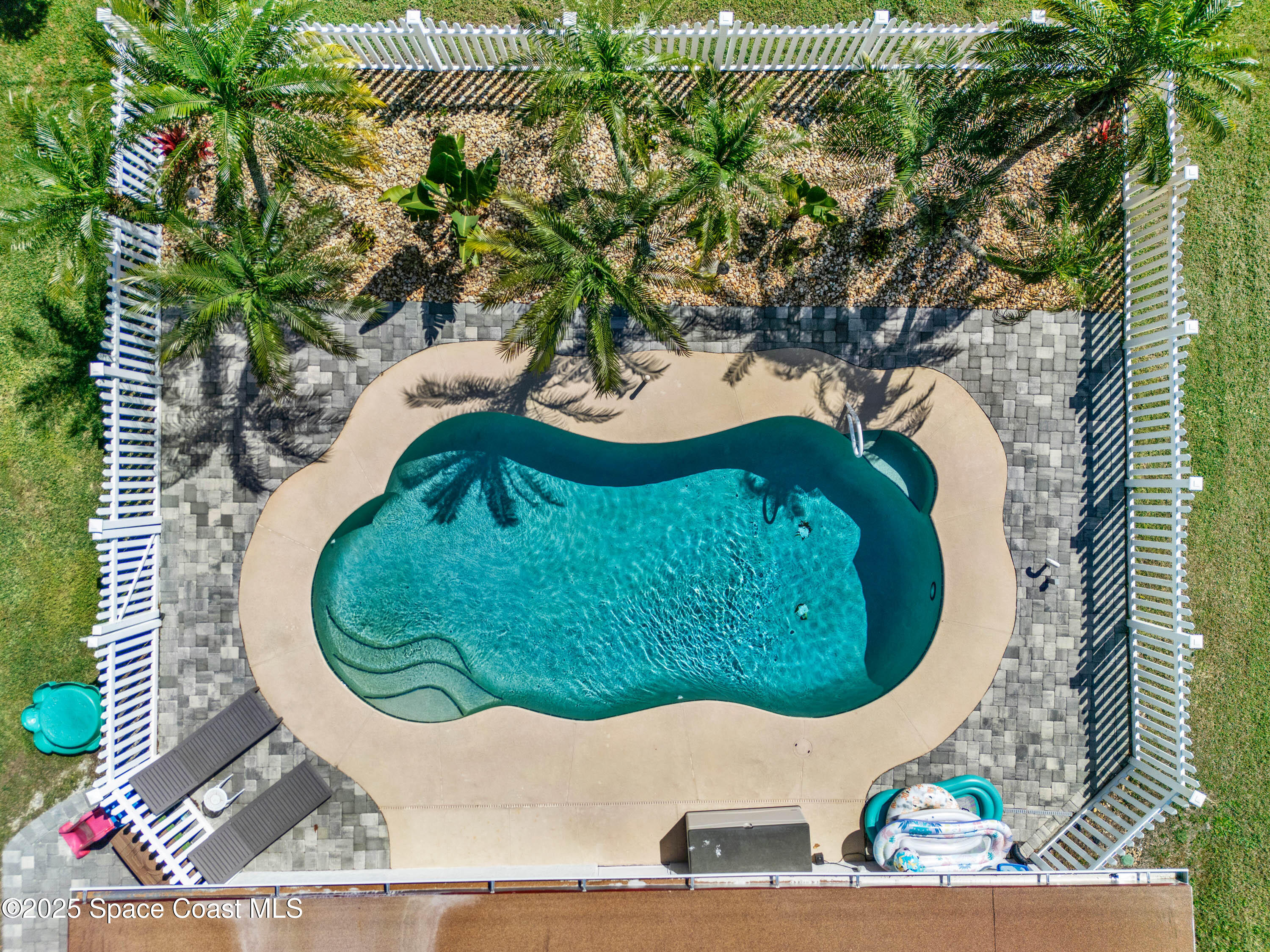 930 Miller Lane Melbourne, FL 32934 - Photo 2 of 40 a view of a fountain in the backyard
