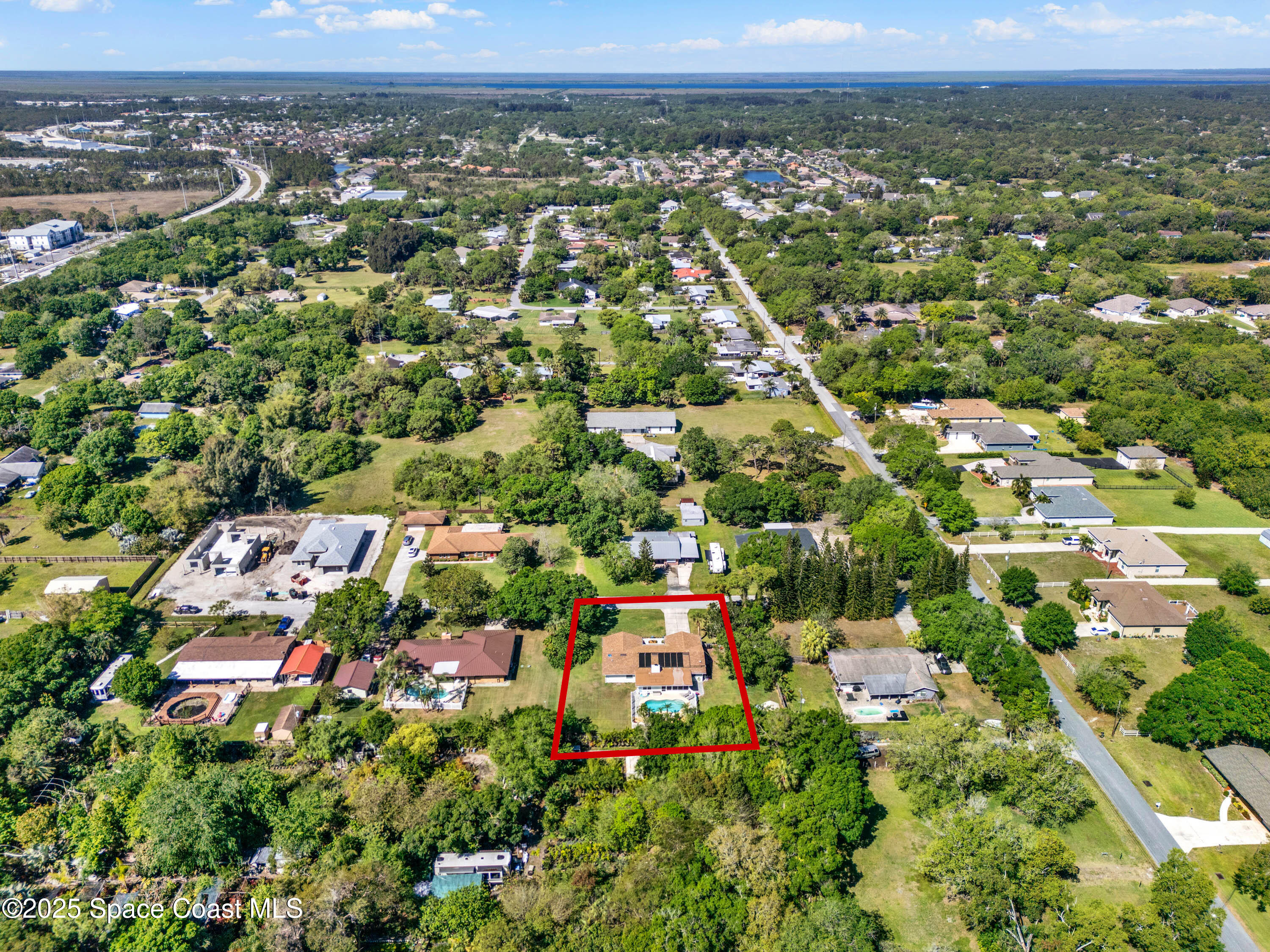 930 Miller Lane Melbourne, FL 32934 - Photo 37 of 40 an aerial view of multiple house