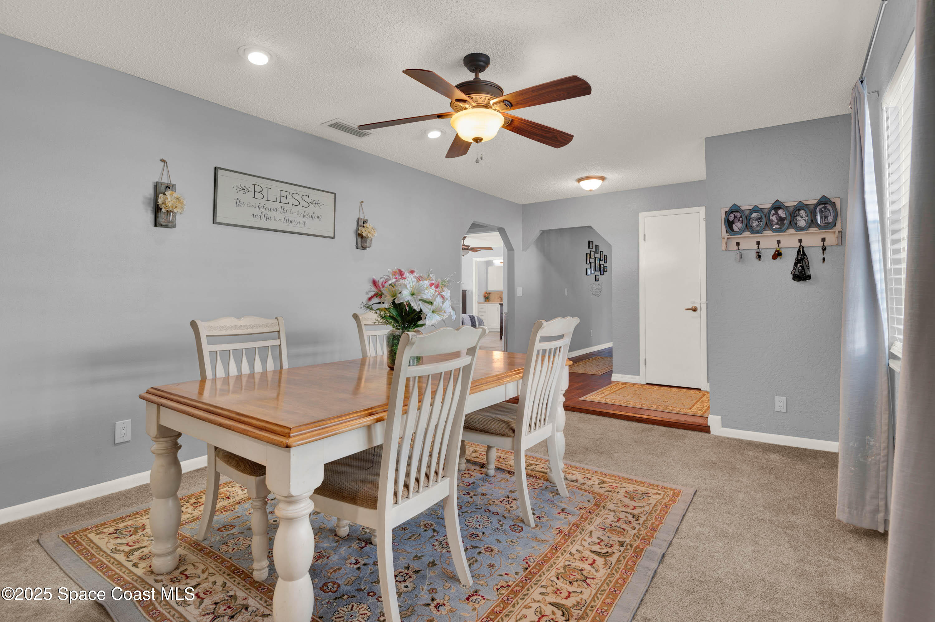 930 Miller Lane Melbourne, FL 32934 - Photo 5 of 40 a dining room with furniture and window