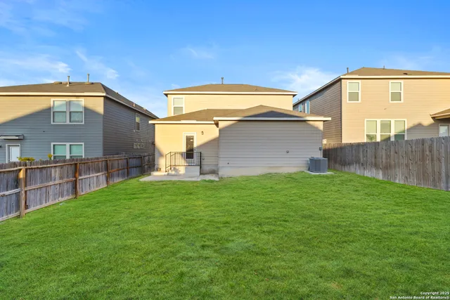 a picture of a bathroom with a bathtub