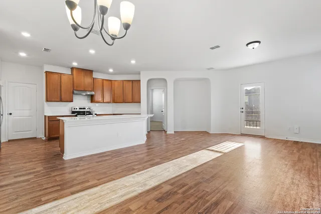 a view of kitchen with cabinets and stainless steel appliances