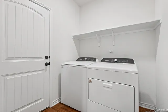 a utility room with dryer and washer