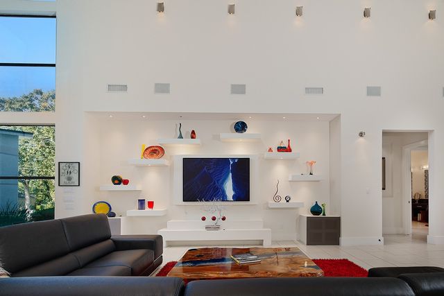 a living room with furniture and a couch