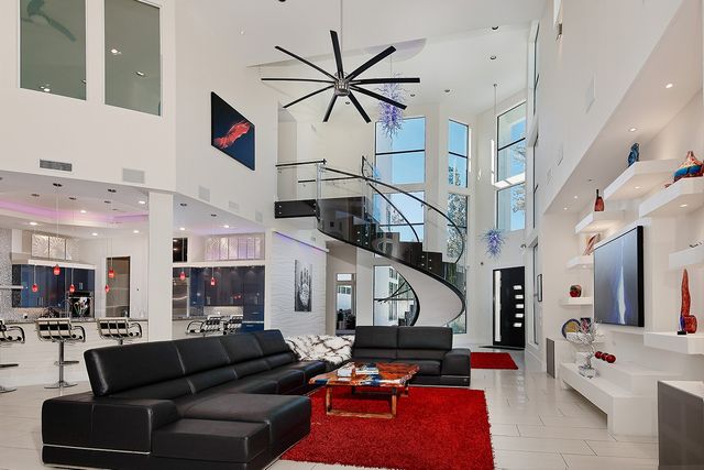 a living room with furniture gym equipment and a view of living room