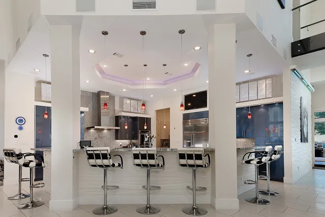 a large kitchen with lots of furniture