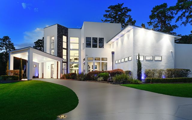 a front view of building with yard