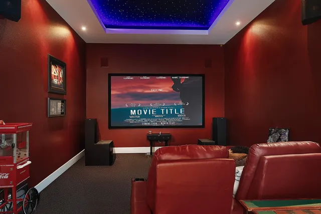 a room with furniture and screen