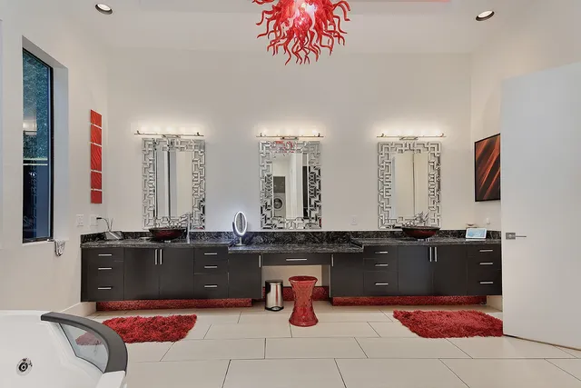 a kitchen with a sink and cabinets