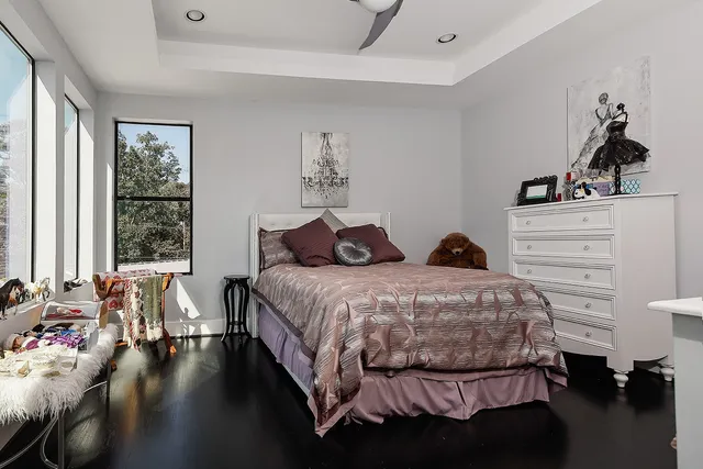 a bedroom with a bed and window