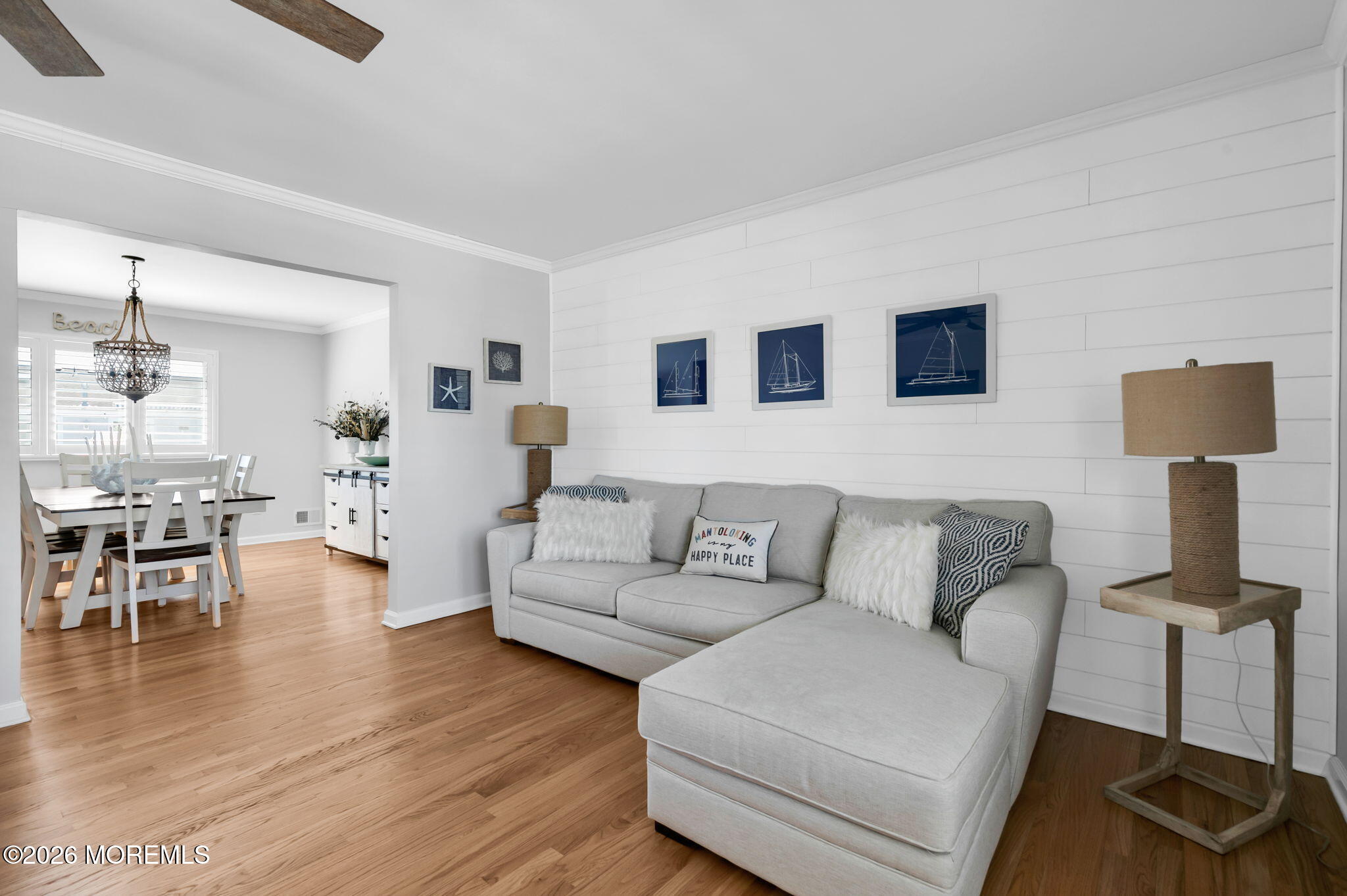 327 Tide Pond Road Mantoloking, NJ 08738 - Photo 11 of 45 a living room with furniture and a wooden floor