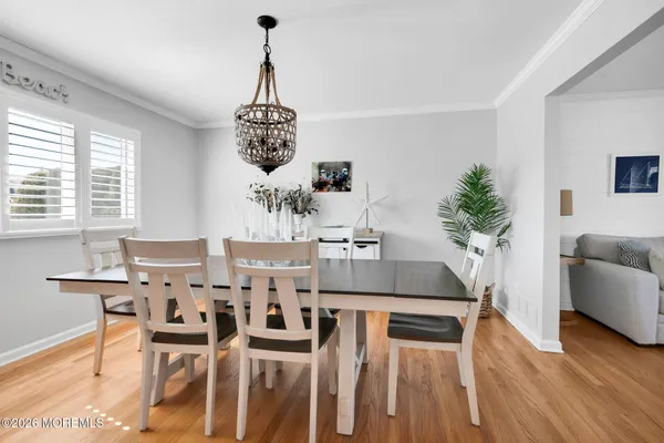 a kitchen with sink cabinets and microwave