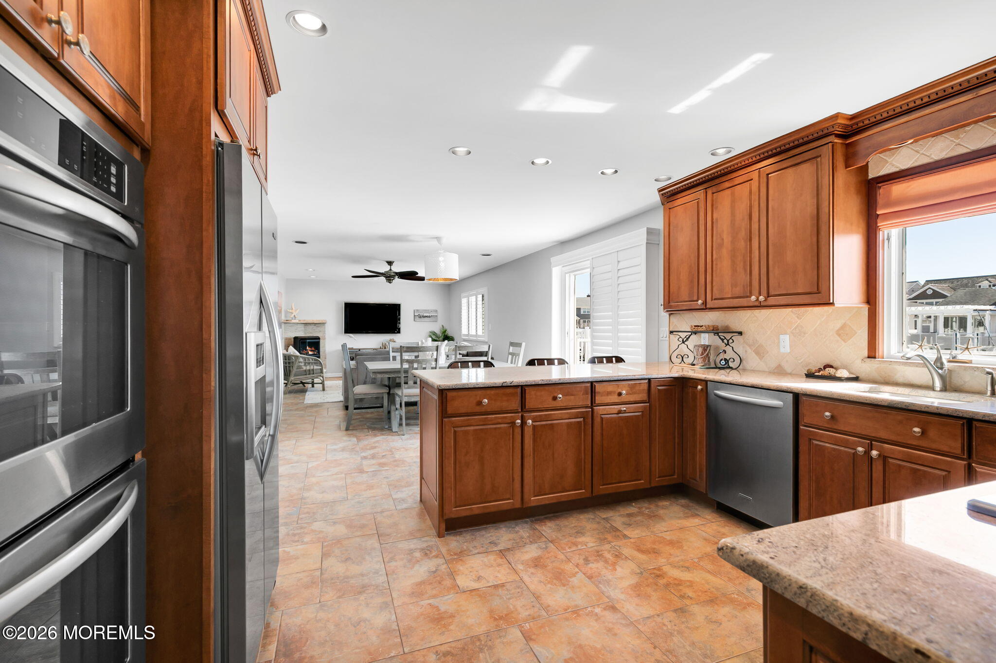 327 Tide Pond Road Mantoloking, NJ 08738 - Photo 15 of 45 a kitchen with sink cabinets and microwave