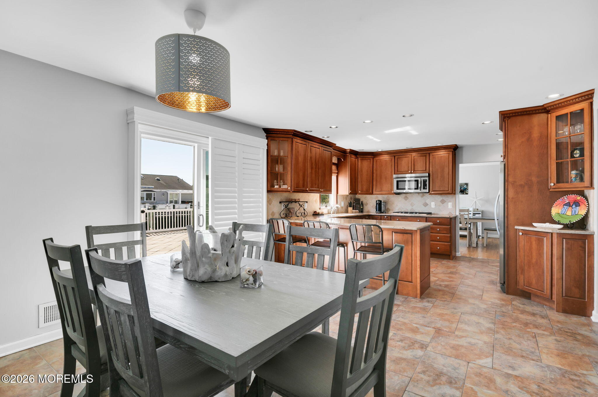 327 Tide Pond Road Mantoloking, NJ 08738 - Photo 18 of 45 a dining room with furniture and window