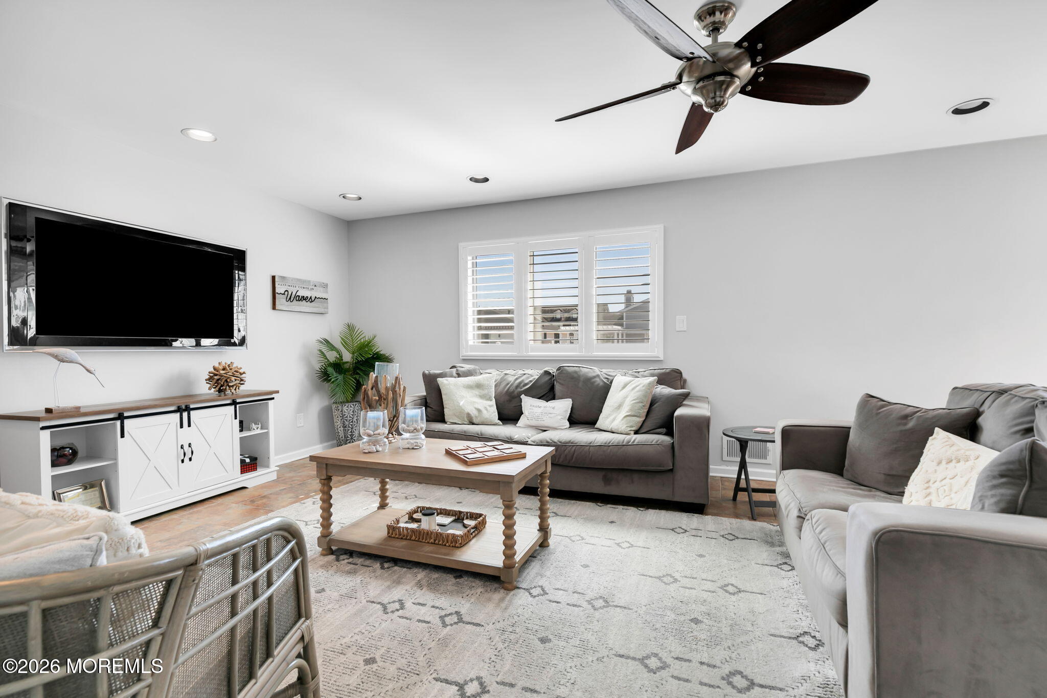 327 Tide Pond Road Mantoloking, NJ 08738 - Photo 21 of 45 a living room with furniture and a flat screen tv