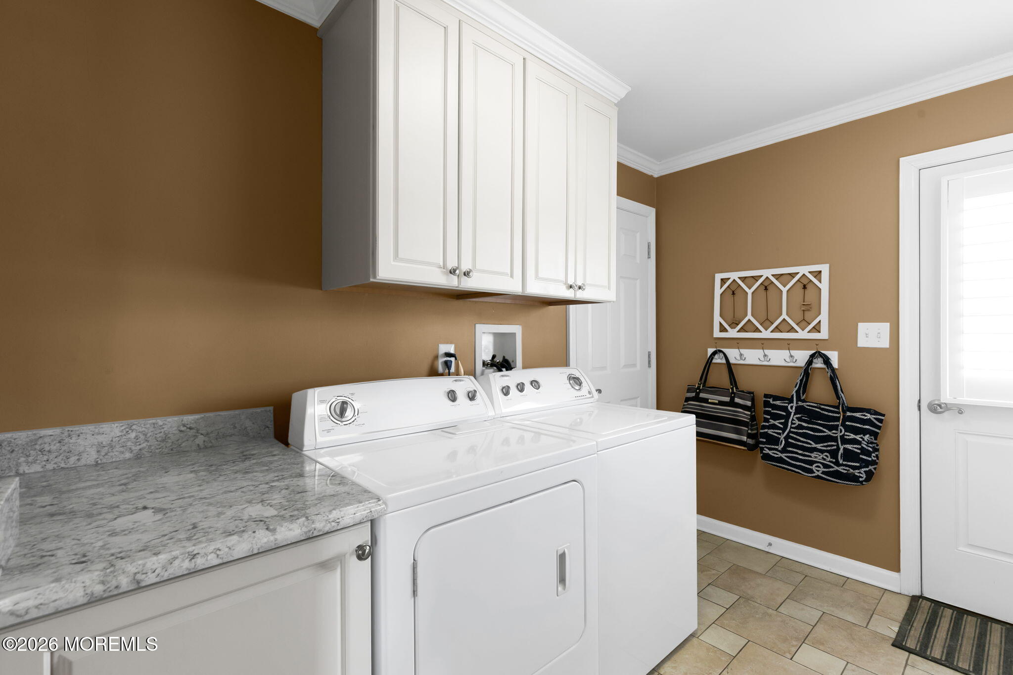 327 Tide Pond Road Mantoloking, NJ 08738 - Photo 23 of 45 a utility room with dryer and washer