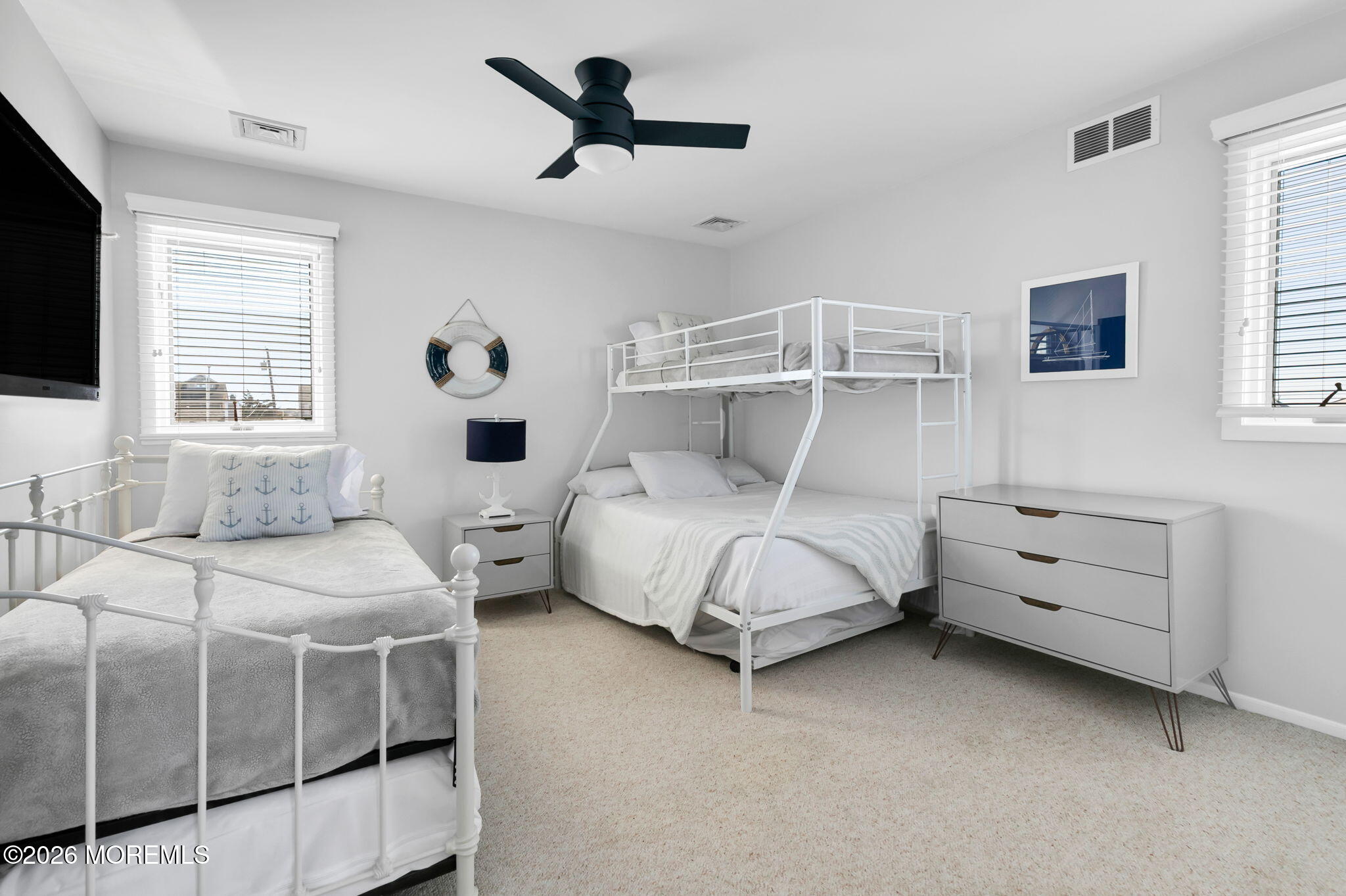 327 Tide Pond Road Mantoloking, NJ 08738 - Photo 33 of 45 a bedroom with two beds and a flat screen tv