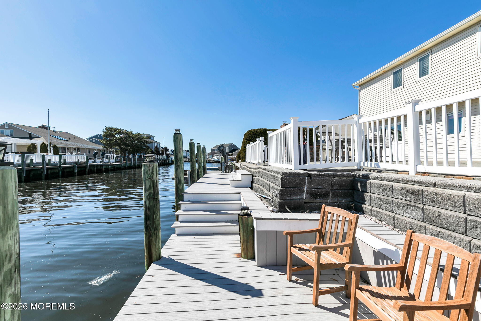327 Tide Pond Road Mantoloking, NJ 08738 - Photo 40 of 45 a view of a house with wooden deck