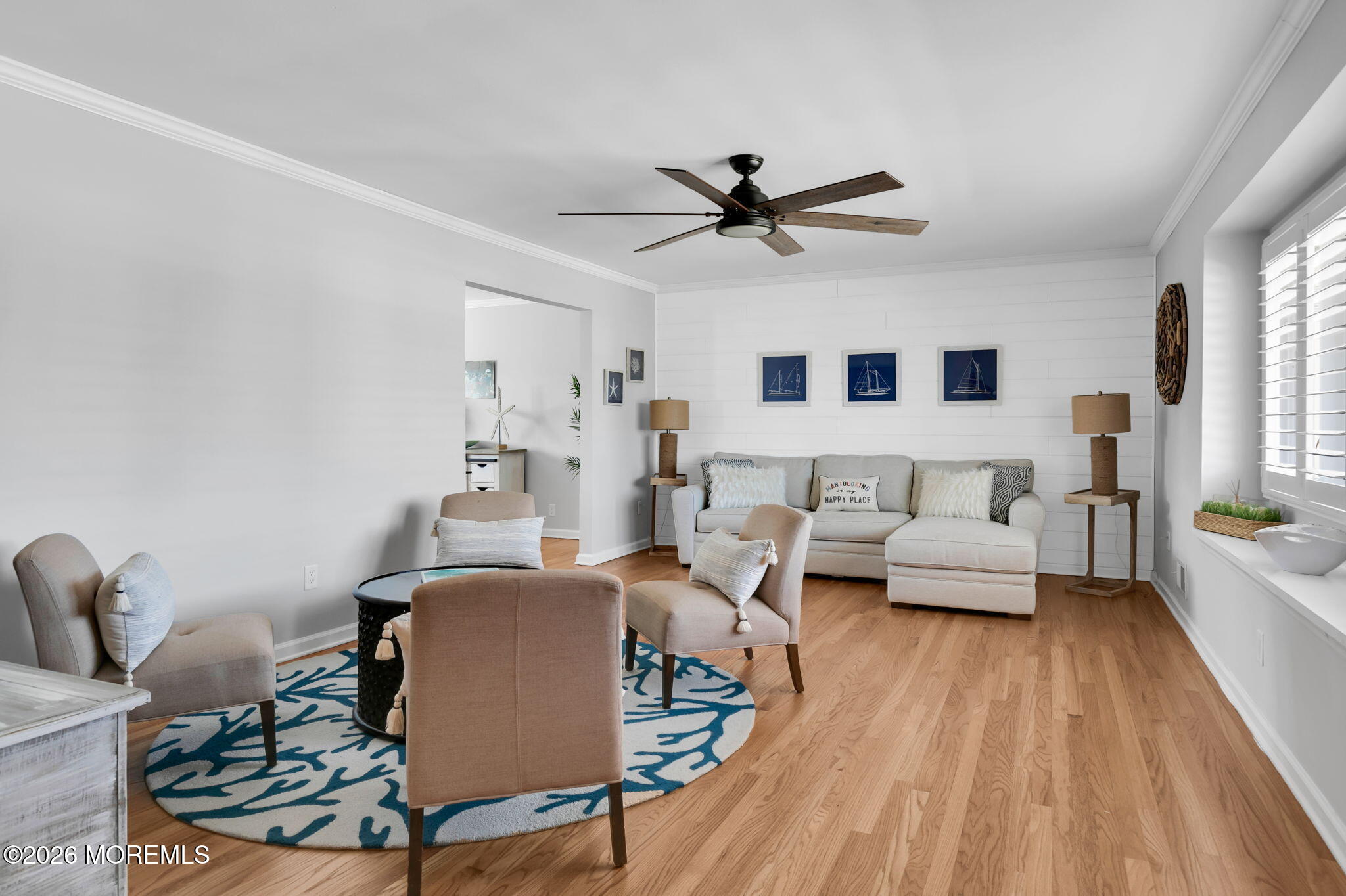 327 Tide Pond Road Mantoloking, NJ 08738 - Photo 9 of 45 a living room with furniture and a wooden floor