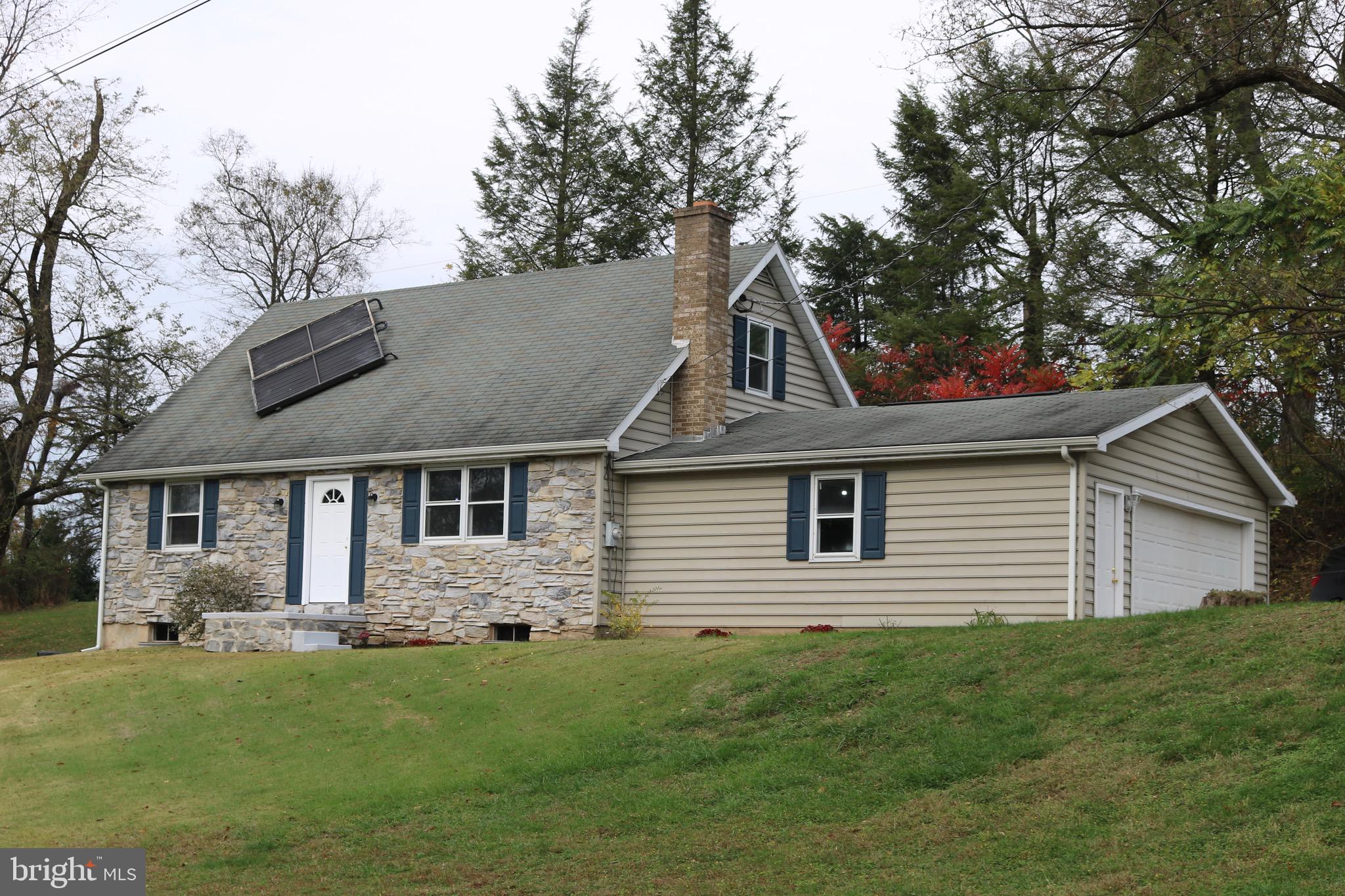 2923 Schoolhouse Road Middletown, PA 17057 - Photo 1 of 28 Beautiful stone cape cod w/ side load 2 cargarage