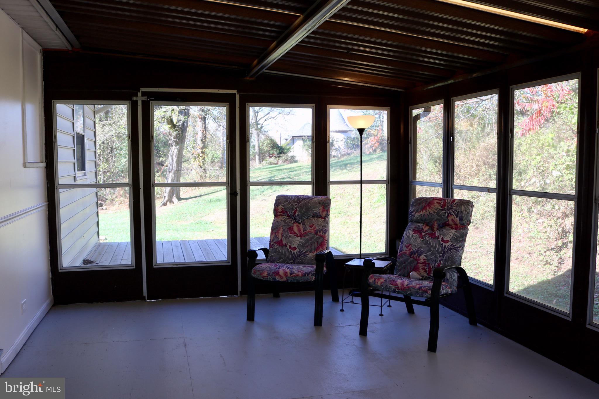 2923 Schoolhouse Road Middletown, PA 17057 - Photo 26 of 28 Large screened in porch with deck