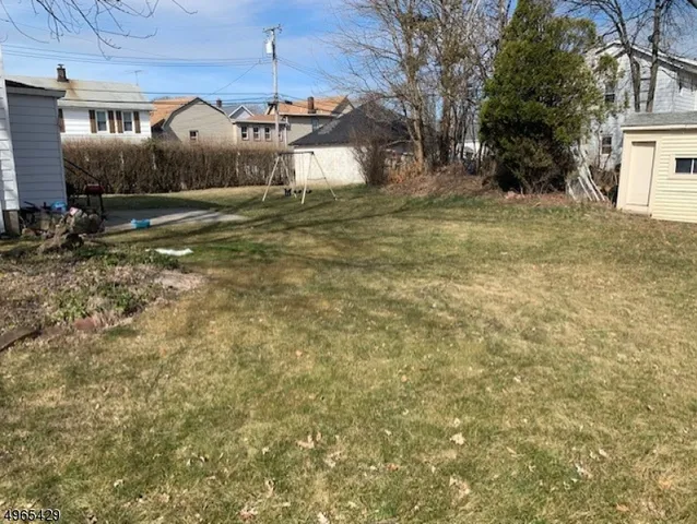 a view of a yard in front of house