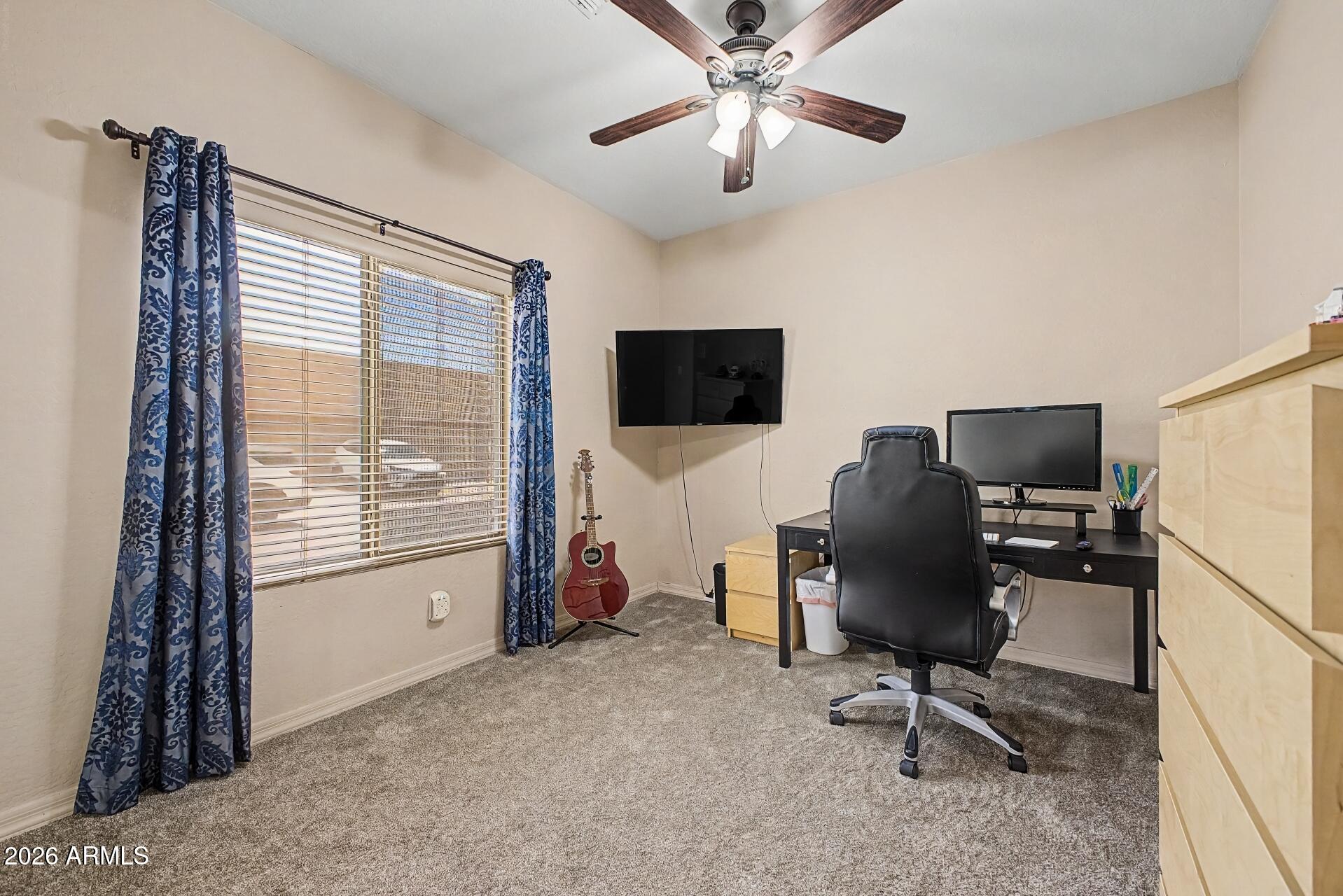 1650 South Crismon Road, Unit 25 Mesa, AZ 85209 - Photo 21 of 33 a workspace with a window