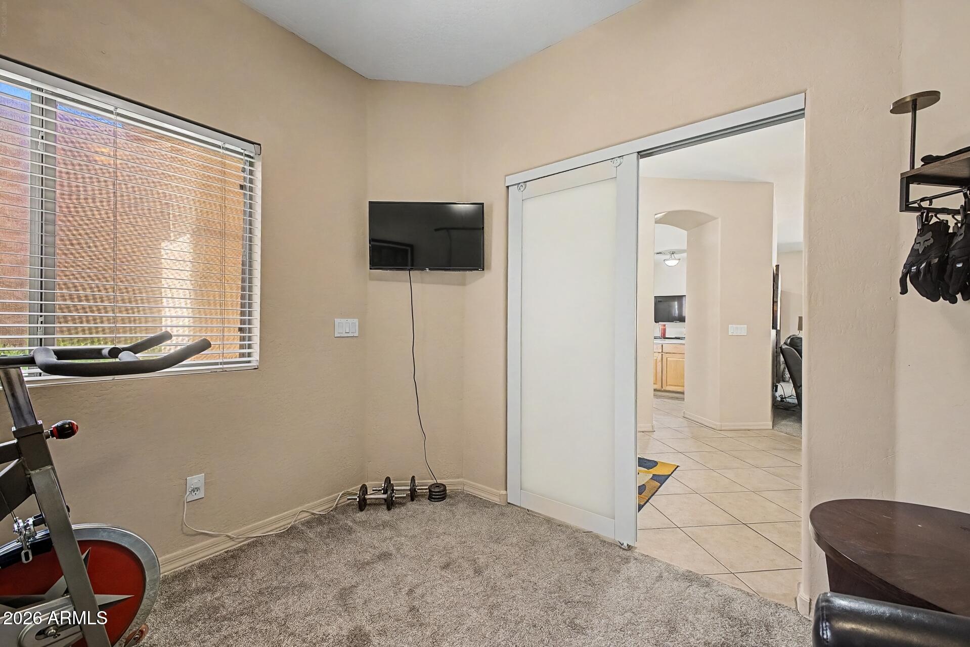 1650 South Crismon Road, Unit 25 Mesa, AZ 85209 - Photo 25 of 33 a view of an empty room and bathroom