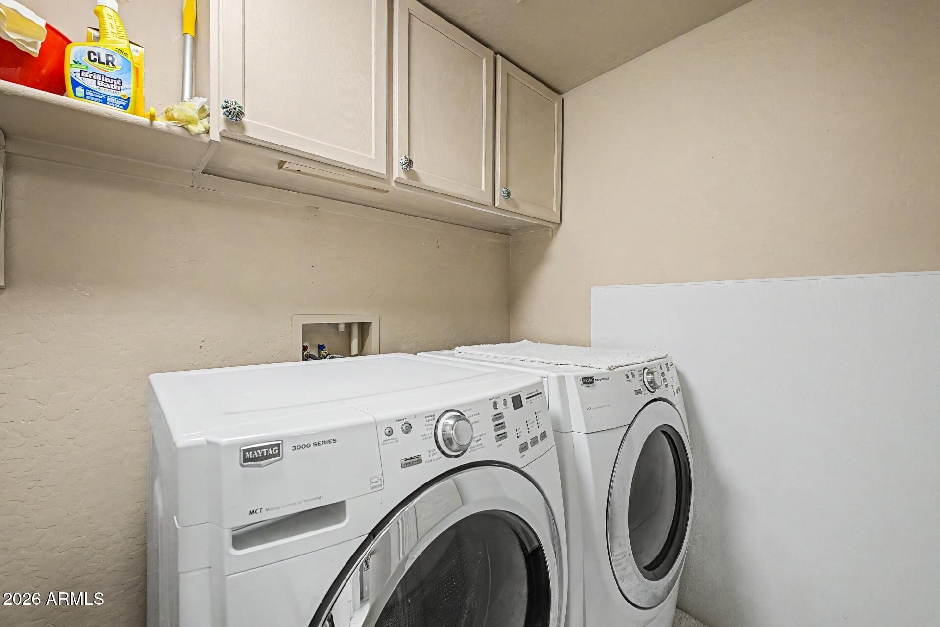 1650 South Crismon Road, Unit 25 Mesa, AZ 85209 - Photo 26 of 33 a utility room with dryer and washer