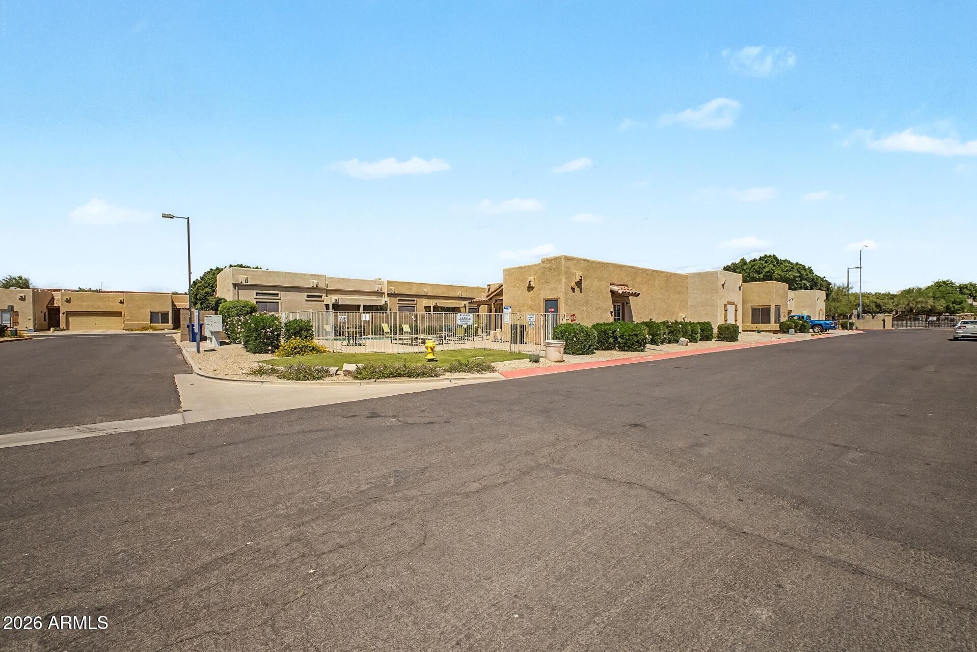 1650 South Crismon Road, Unit 25 Mesa, AZ 85209 - Photo 33 of 33 a view of a city street with a road