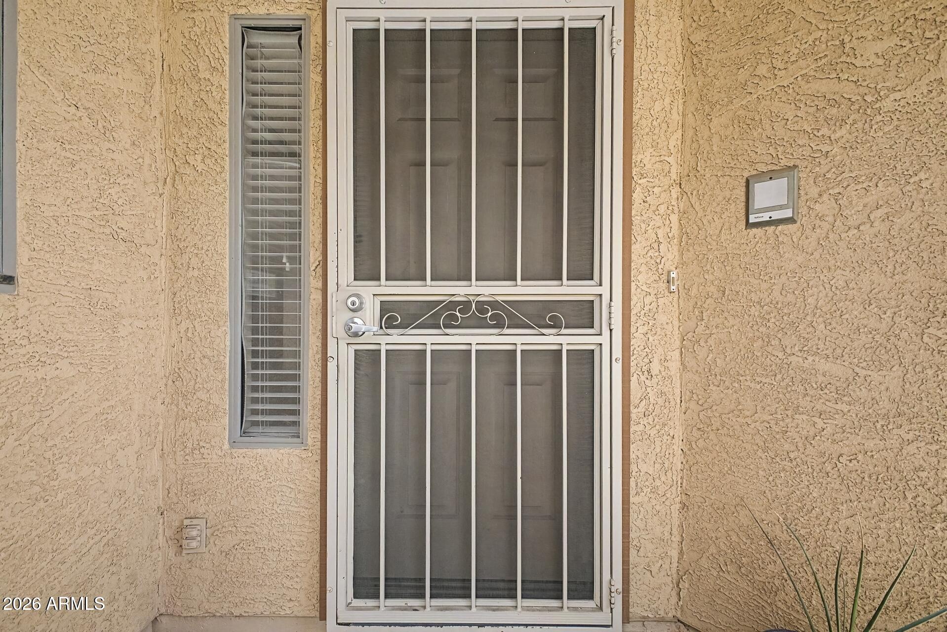 1650 South Crismon Road, Unit 25 Mesa, AZ 85209 - Photo 5 of 33 a view of a door