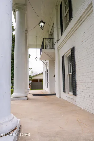 a view of a house with a small yard