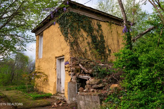a view of a house with a street