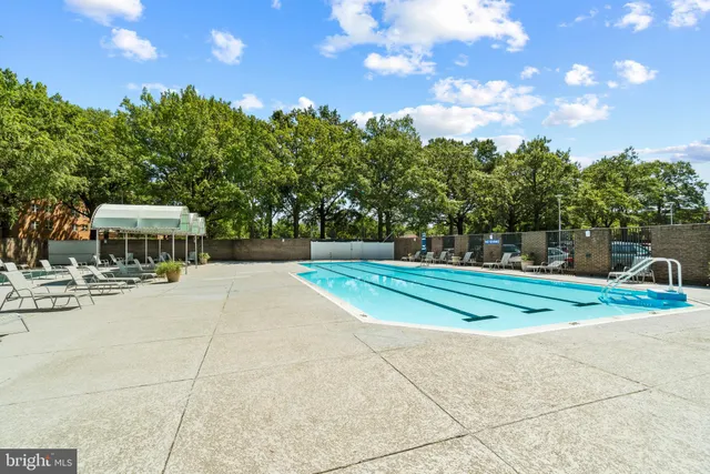 a view of a playground with basketball court