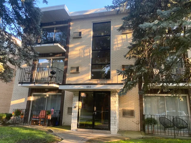 a view of a brick building with a outdoor space