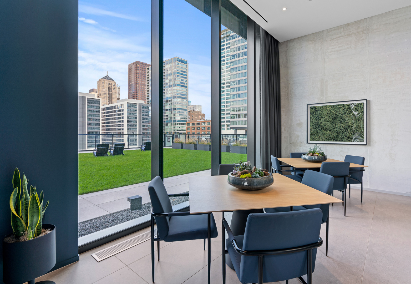 234 West Polk Street, Unit 3411 Chicago, IL 60607 - Photo 19 of 37 a view of an outdoor dining space with furniture and garden