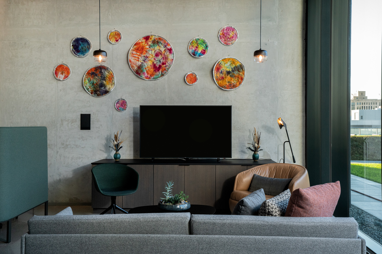 234 West Polk Street, Unit 3411 Chicago, IL 60607 - Photo 21 of 37 a living room with furniture and a flat screen tv