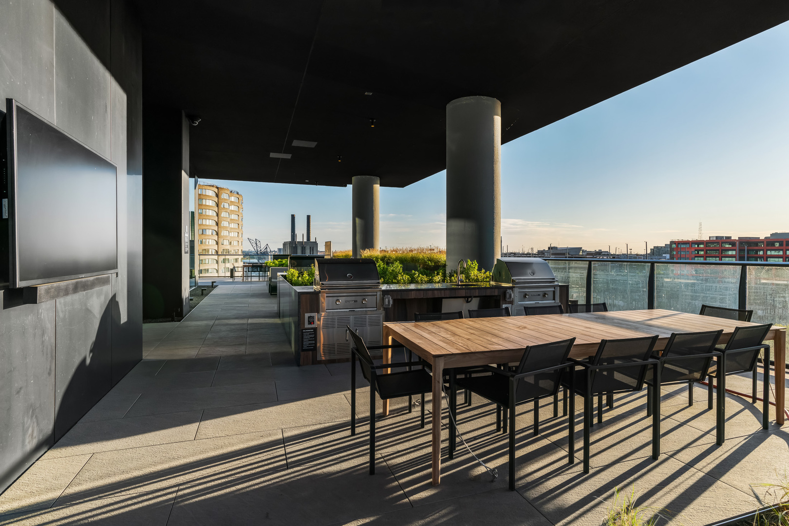 234 West Polk Street, Unit 3411 Chicago, IL 60607 - Photo 33 of 37 a view of a patio with table and chairs