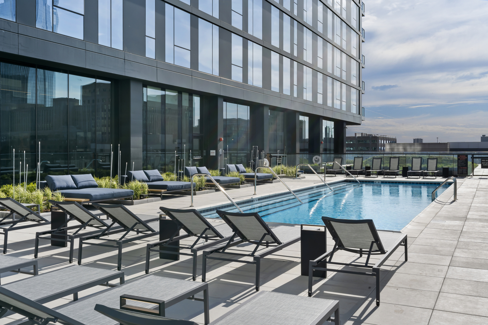 234 West Polk Street, Unit 3411 Chicago, IL 60607 - Photo 35 of 37 a swimming pool with outdoor seating and yard