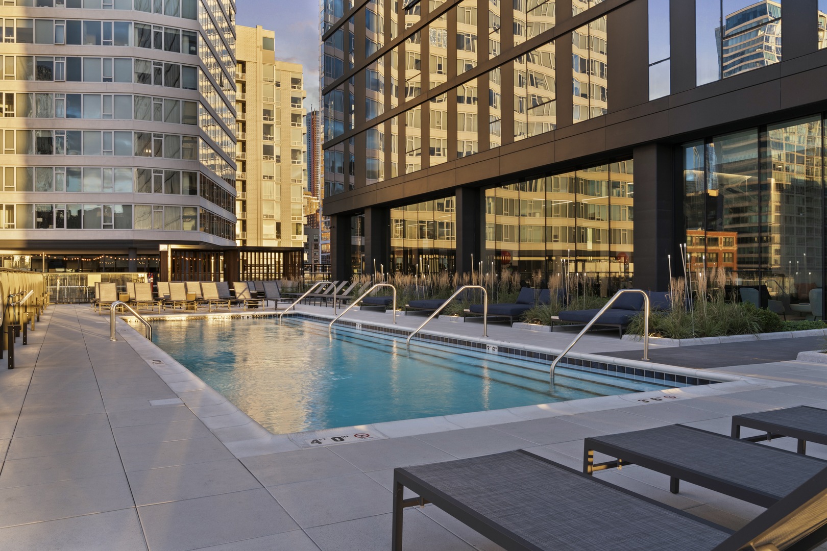 234 West Polk Street, Unit 3411 Chicago, IL 60607 - Photo 37 of 37 a view of a swimming pool with outdoor seating