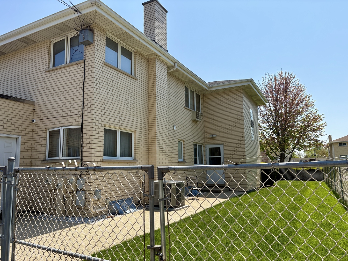 5600 St Charles Road Berkeley, IL 60163 - Photo 5 of 25 a front view of house with yard