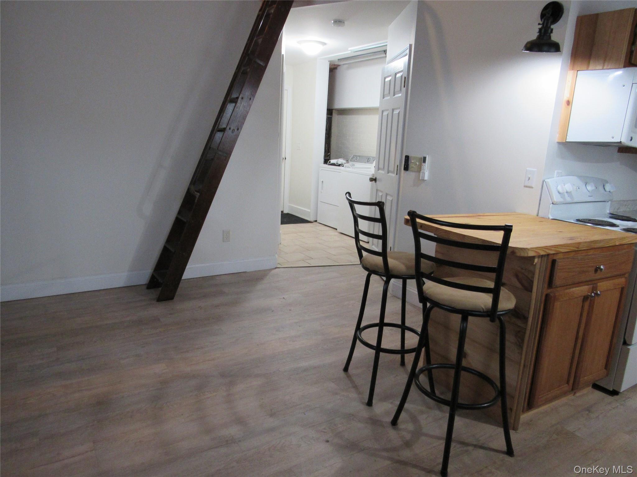 76 Webster Avenue Goshen, NY 10924 - Photo 3 of 15 a view of hall way with furniture and stairs