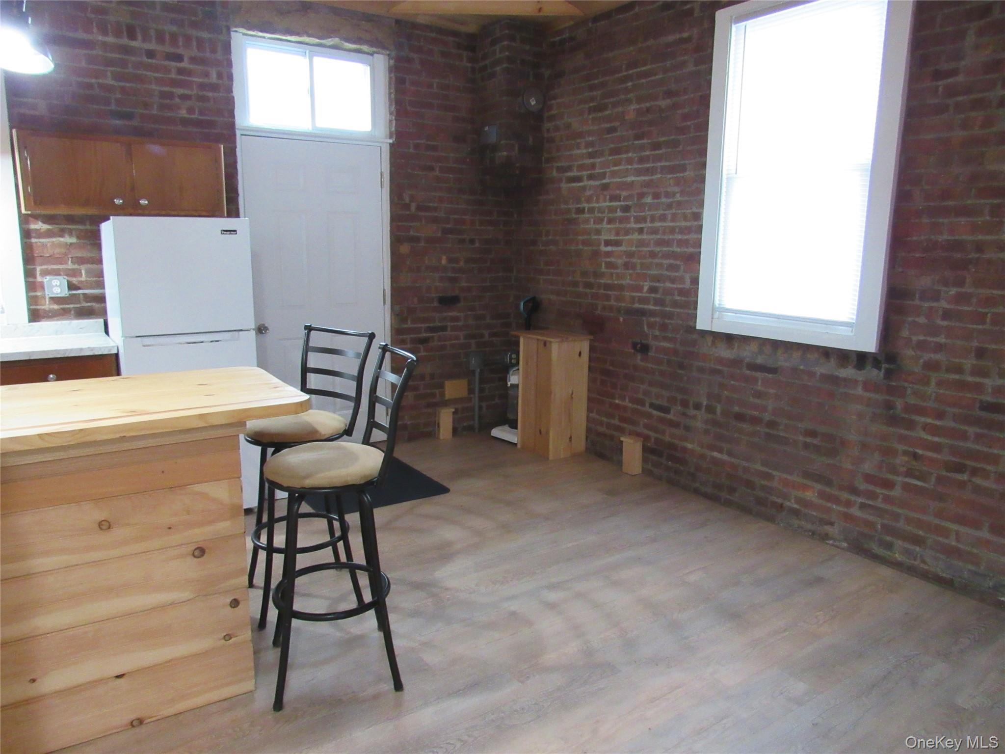 76 Webster Avenue Goshen, NY 10924 - Photo 7 of 15 a balcony with table and chairs